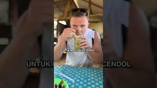 Laurence Benson eats LEMPER from Indonesia