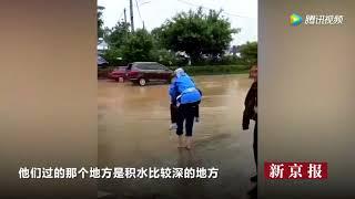 Elderly man carries wife over puddle proves true love exists