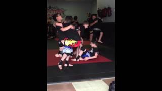 Kids having a little fun carrying each other in training with master Edmar dos Anjos