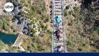 Tibetan-style bridge suspended more than 570 feet above the ground connects two Italian villages