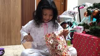 Darla Unboxing the presents  on Christmas Day 2018