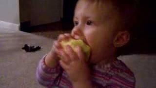 baby eating apple