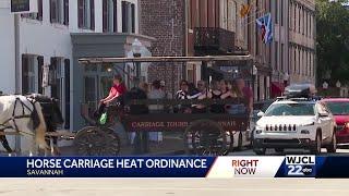 When are Savannahs horse-drawn carriage rides suspended due to hot weather?