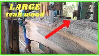 The process of making teak wood beams.teakwood sawing