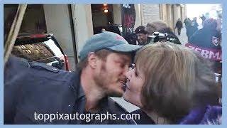 Travis Fimmel kisses a fan & makes her day signs autographs for TopPix