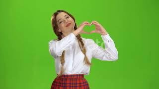 Girl Shows the Heart Shape. Green Screen  Stock Footage - Envato elements