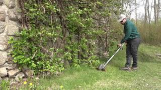 Husqvarna 110iL battery grass trimmer in action