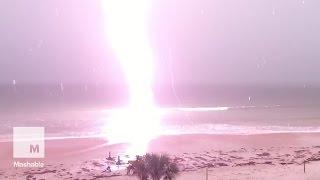 Captivating slow motion footage shows moment lightning strikes a beach  Mashable