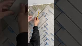 Cutting herringbone tile pattern