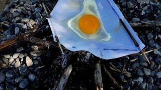 cooking egg in a paper  fried egg in a paper  survival cooking