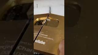 CUTTING GOLD PLAY BUTTON II INSIDE GOLD PLAY BUTTON #shortsfeed #youtubeshorts #newviralshorts #new