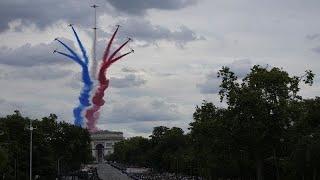 Frances Bastille Day parade meets the Olympic torch relay