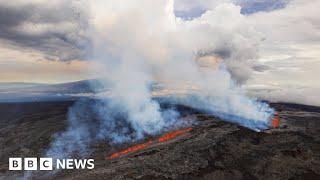 Worlds largest active volcano erupts in Hawaii - BBC News