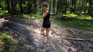 Olga walking barefoot through deep mud and smelly puddles barefoot in mud muddy feet # 1438