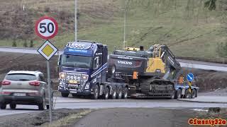 4K Volvo FH16 750 Transporting and Unloading A Volvo EC480E Excavator