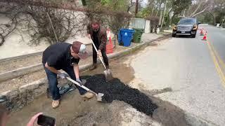 Arnold Schwarzenegger fixes a pothole