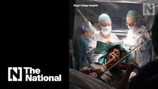 Patient plays violin during brain surgery in a London hospital