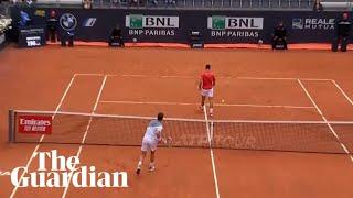 Cameron Norrie smashes ball into Novak Djokovics legs as world No 1 turns back on net