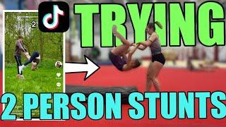 GYMNASTS TRY VIRAL TIKTOK ACRO STUNTS  best 2 person tricks