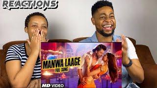 African Couple Reacts To OFFICIAL Manwa Laage   Happy New Year  Shah Rukh Khan  Arijit Singh 