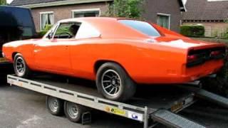 1969 Dodge Charger on transport.