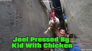 KangJoel Pressed By Kid With Chicken In Mumbai India