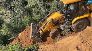 Mountain Road Making for the Mountain Tea Farmers JCB Backhoe Loader