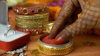 Closeup of henna mehndi on woman hands taking sindoor from a g...  Indian Stock Footage  Knot9