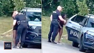 Cop Allegedly Caught Kissing Getting in Backseat of Patrol Car with Woman Now Under Investigation