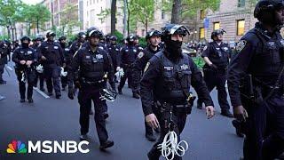BREAKING NYPD officers in full riot gear descend on Columbia University campus to clear protesters