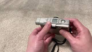 Demonstrating loading an APS film into the Canon IXUS Z70