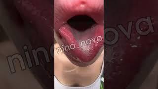 Long tongue piercing tricks showing mouth and uvula with spit