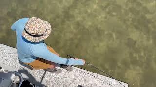 05.09.24.   Happy angler landing a spunky bonefish