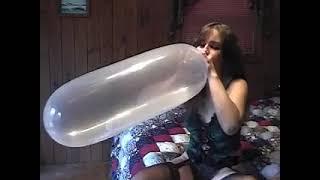 Girl blows to pop a condom