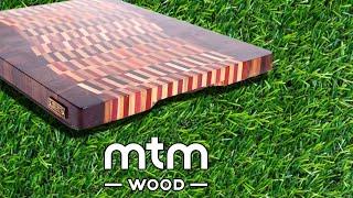 Curved chaotic pattern end grain cutting board