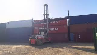 Svetruck Shipping Container Handler stacking containers in depot