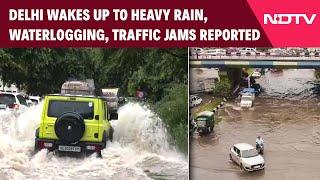 Delhi Rain Today News  Delhi Wakes Up To Heavy Rain. Waterlogging Traffic Jams Reported