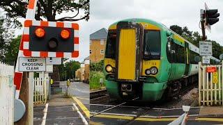 Two Trains at Horsham Level Crossing West Sussex