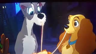 102 Dalmatians dogs watching lady and a tramp