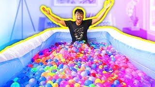 1000+ WATER BALLOONS IN A POOL