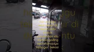 banjir di pintu masuk perumahan vila mutiara gading kp. Bogor kec.tarumajaya Bekasi