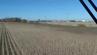 CF-18 fly over while harvesting soybean.