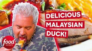 Guy Fieri Tries DELICIOUS Malaysian Duck  Diners Drive-Ins & Dives