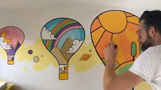 Mural for Zoe – Baby room wallpainting with colourful balloonscape