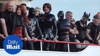 Leather-clad fetishists hold erotic S&M party on Germanys lake