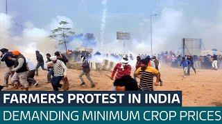 Police in India try to stop farmers protesting in New Delhi  ITV News