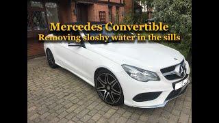 Mercedes A207 e250 draining trapped water in the sills.