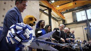 Cutting the ribbon of the new Penn State Engineering Design and Innovation Building