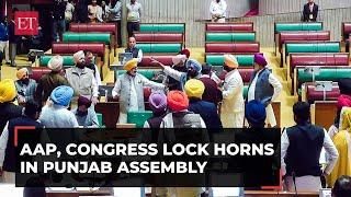 Punjab AAP Congress lock horns in Assembly State Cong chief Warring carried out by marshals