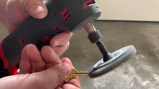 Mobile locksmith hack.  Portable key brush using a Milwaukee M12 right angle dye grinder.